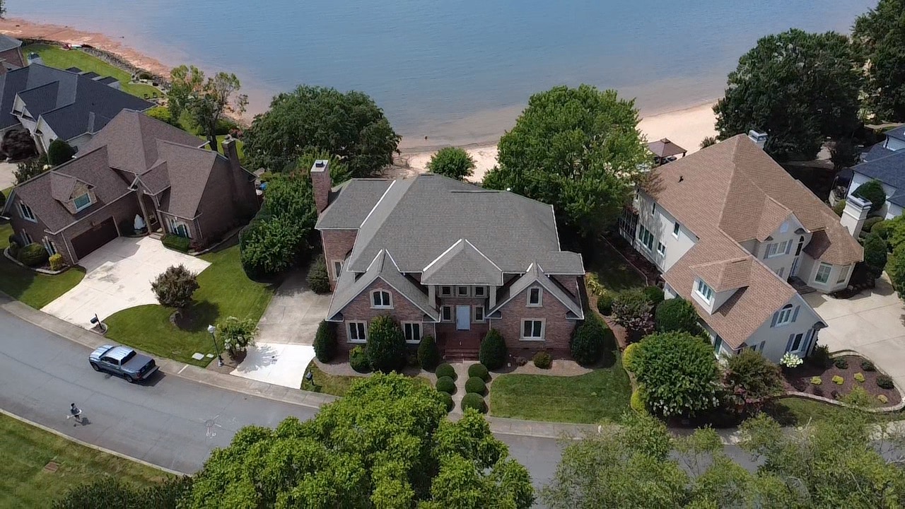 Aerial view of a custom lakefront residence