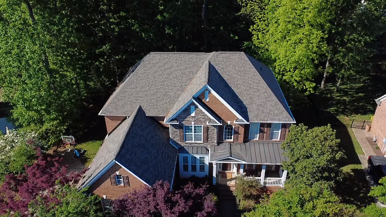 Completed Mint Hill home with Owens Corning Duration shingles in Driftwood
